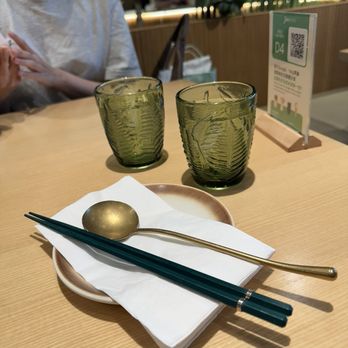 Jun Bistro - Place setting with the cool green cups - Chinese Near Me - Milpitas, California Jun Bistro - Place setting with the cool green cups - Chinese Near Me - Milpitas, California