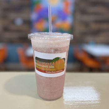 Tangerine Tree Luncheonette - a smoothie in a plastic cup - Juice Bars & Smoothies Near Me - Crystal River, Florida Tangerine Tree Luncheonette - a smoothie in a plastic cup - Juice Bars & Smoothies Near Me - Crystal River, Florida