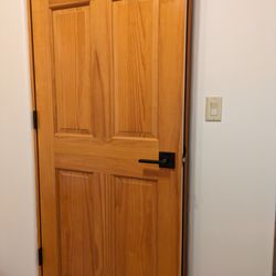 Pat's Doors - Tony re-finished old pine doors and installed new flat black hardware