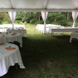 Tent, tables, linens, and chairs