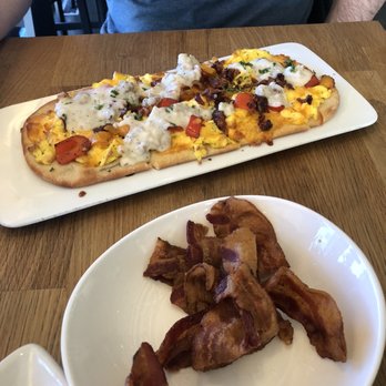 Carnivore - Breakfast flatbread and side of back - Steakhouses Near Me - St. Louis, Missouri Carnivore - Breakfast flatbread and side of back - Steakhouses Near Me - St. Louis, Missouri