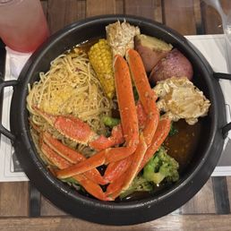 C4 snow crab legs, garlic noodles, potatoes, corn, broccoli C4 snow crab legs, garlic noodles, potatoes, corn, broccoli
