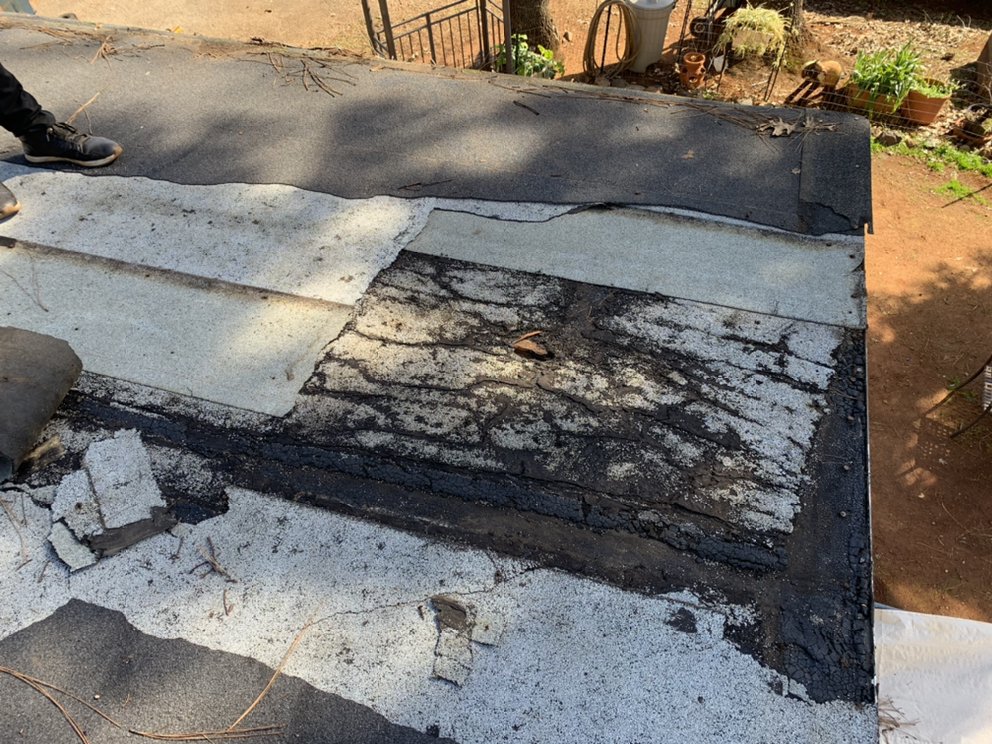 Slide of John Stahl Roofing