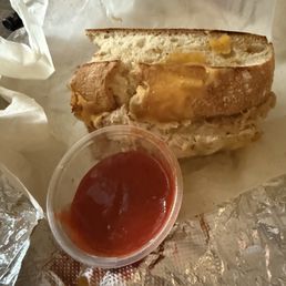 $17 with tax for a sandwich of canned tuna smaller than 3 of these small sauce cups