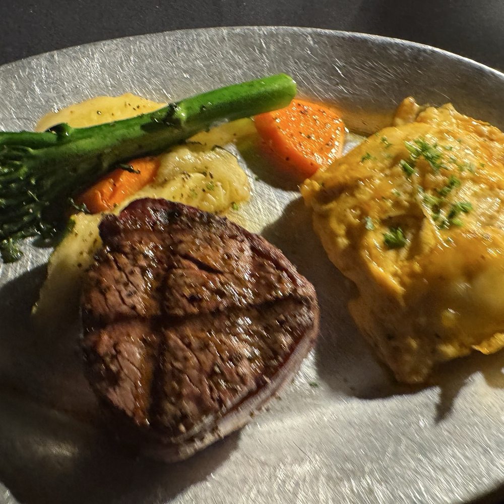 Antiquity Restaurant - Petite 6.0 oz filet with broccolini, carrots and scalloped potatoes - Seafood Near Me - Albuquerque, New Mexico