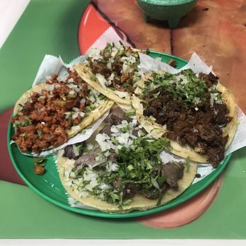 La Chaparrita Grocery - Clockwise: Taco de longaniza, tripas, asada, al pastor. - Grocery Near Me - Chicago, Illinois