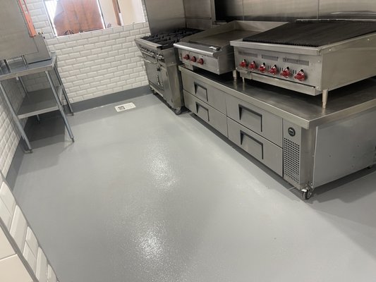 Epoxy Flooring - Epoxy flooring has become the new trend for kitchen flooring to prevent slips and falls. Since the flooring is textured, it offers additional grip and safety. Epoxy Flooring - Epoxy flooring has become the new trend for kitchen flooring to prevent slips and falls. Since the flooring is textured, it offers additional grip and safety.