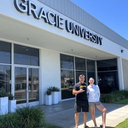 Exterior outside entrance of Gracie University - TJ and daughter - Torrance, California Exterior outside entrance of Gracie University - TJ and daughter - Torrance, California