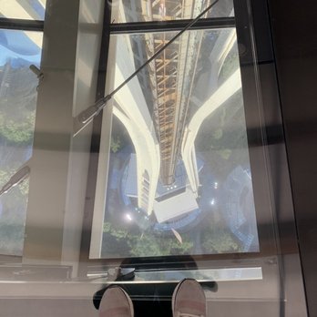 Space Needle - Looking down from the observation deck, glass bottom - Landmarks & Historical Buildings Near Me - Seattle, Washington Space Needle - Looking down from the observation deck, glass bottom - Landmarks & Historical Buildings Near Me - Seattle, Washington