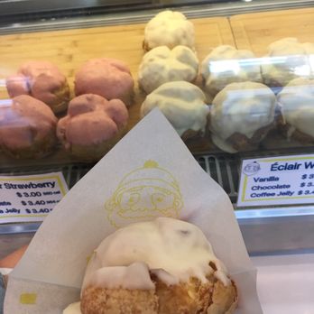 Beard Papa's - Different flavors of eclair: strawberry, vanilla, chocolate or plain. - Desserts Near Me - Los Angeles, California