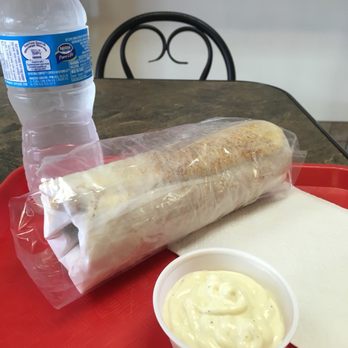 Top Donair - Super with side garlic sauce and water. Not bad for $11.50 - Donairs Near Me - Edmonton, Alberta