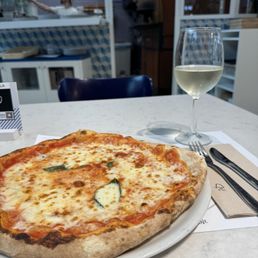 Margarita pizza and a prosecco. Margarita pizza and a prosecco.