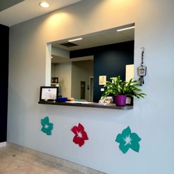 OPPT Optimal Performance & Physical Therapy - June 2021: Lobby view of the receptionist's desk. At this time, temp checks & masks are mandatory