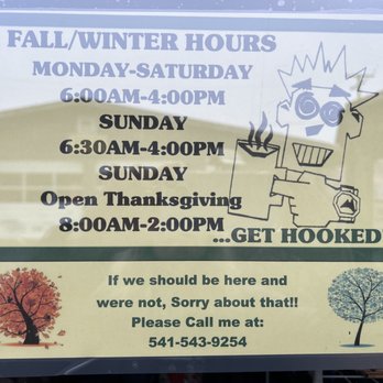 The Quick Fix Coffee Company - a sign in the window - Coffee & Tea Near Me - Eugene, Oregon