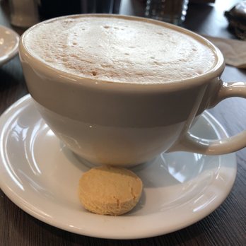 Maria Empanada - Big cup of cappuccino and a butter cookie when checked in. - Empanadas Near Me - Denver, Colorado Maria Empanada - Big cup of cappuccino and a butter cookie when checked in. - Empanadas Near Me - Denver, Colorado