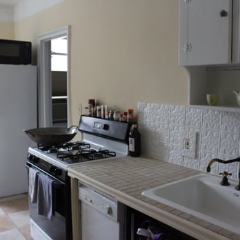 Paintzen - New York - Kitchen repainted with "macadamia nut" color from Benjamin Moore. - Painters Near Me - New York, New York Paintzen - New York - Kitchen repainted with "macadamia nut" color from Benjamin Moore. - Painters Near Me - New York, New York