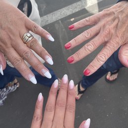 Mine are the pink French ombre. My moms is the left done by Helen.