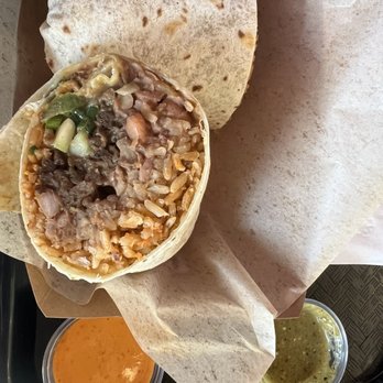 Chicana - The Mexigogi Clasico with a side of both salsas; packed full of flavors and filling. - Vegan Near Me - Fullerton, California Chicana - The Mexigogi Clasico with a side of both salsas; packed full of flavors and filling. - Vegan Near Me - Fullerton, California