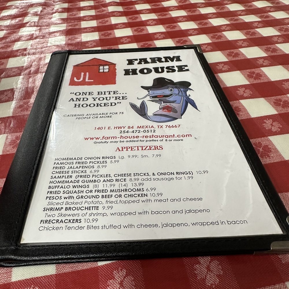 a menu on a red and white checkered tablecloth a menu on a red and white checkered tablecloth