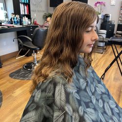 Tanya’s Hair Design - Young girl wanted hair cut shorter in the front and wanted to keep the length