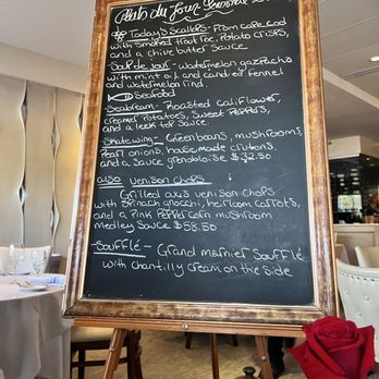 Paris 7th - a menu on a blackboard in a restaurant - French Near Me - Fort Worth, Texas