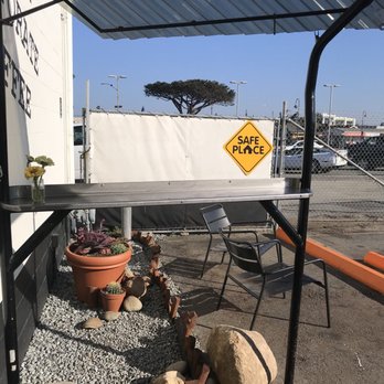 Acme Coffee Roasting - Outdoor seating. And I loved the safe space sign - Coffee & Tea Near Me - Seaside, California