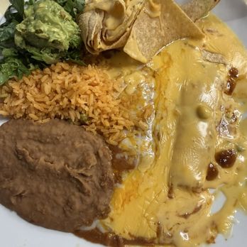 El Mariachis - Tex Mex Dinner - one enchilada with gravy and one with chili con queso. Refried beans & rice. Quac. And chips with chili con queso. $14 - Bars Near Me - Liberty Hill, Texas El Mariachis - Tex Mex Dinner - one enchilada with gravy and one with chili con queso. Refried beans & rice. Quac. And chips with chili con queso. $14 - Bars Near Me - Liberty Hill, Texas