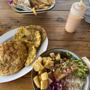 Barroco - Salmon bowl with guac, puerta #2 arepa & tostones YUM! (Salmon bowl was huge could only finish 1/2 so plenty of leftovers). - Latin American Near Me - Lakewood, Ohio