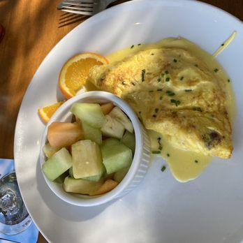 Bagatelle - Lobster omelette with fruit, very seafoody (husband liked it, too much for me). - Seafood Near Me - Key West, Florida Bagatelle - Lobster omelette with fruit, very seafoody (husband liked it, too much for me). - Seafood Near Me - Key West, Florida