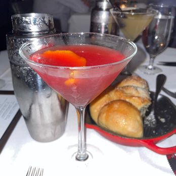 Steak 48 - Pomegranate Blood Orange Martini! You keep the shaker which has more in it so it's like 2 drinks in one. - Steakhouses Near Me - Houston, Texas Steak 48 - Pomegranate Blood Orange Martini! You keep the shaker which has more in it so it's like 2 drinks in one. - Steakhouses Near Me - Houston, Texas