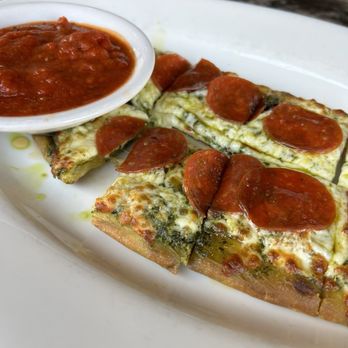 Lucky's 13 Pub - HH flatbread - they called it something like "French bread bites". Pesto, mozzarella, pepperoni and hot honey. - American Near Me - Plymouth, Minnesota Lucky's 13 Pub - HH flatbread - they called it something like "French bread bites". Pesto, mozzarella, pepperoni and hot honey. - American Near Me - Plymouth, Minnesota