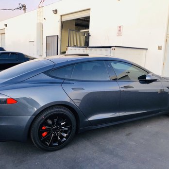 Dependable Guys - model s: window tint, gloss black chrome delete, gloss black powder coat rims, red calipers, red T logos - Auto Customization Near Me - Santa Ana, California