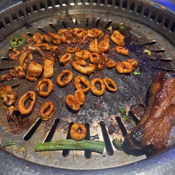 Gen Korean BBQ House - A grill, burnt to a crisp, that we have been cooking on for almost an hour - Korean Near Me - Alhambra, California Gen Korean BBQ House - A grill, burnt to a crisp, that we have been cooking on for almost an hour - Korean Near Me - Alhambra, California
