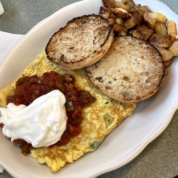 Water Wheel Breakfast & Gift House - An omelet with salsa, sour cream, home fries, and a grilled English muffin. - Breakfast & Brunch Near Me - Jefferson, New Hampshire Water Wheel Breakfast & Gift House - An omelet with salsa, sour cream, home fries, and a grilled English muffin. - Breakfast & Brunch Near Me - Jefferson, New Hampshire