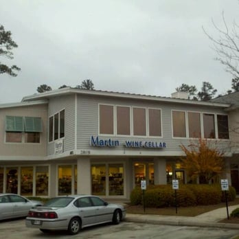 Martin Wine & Spirits - wo cars parked in front of a building - Beer, Wine & Spirits Near Me - Mandeville, Louisiana Martin Wine & Spirits - wo cars parked in front of a building - Beer, Wine & Spirits Near Me - Mandeville, Louisiana