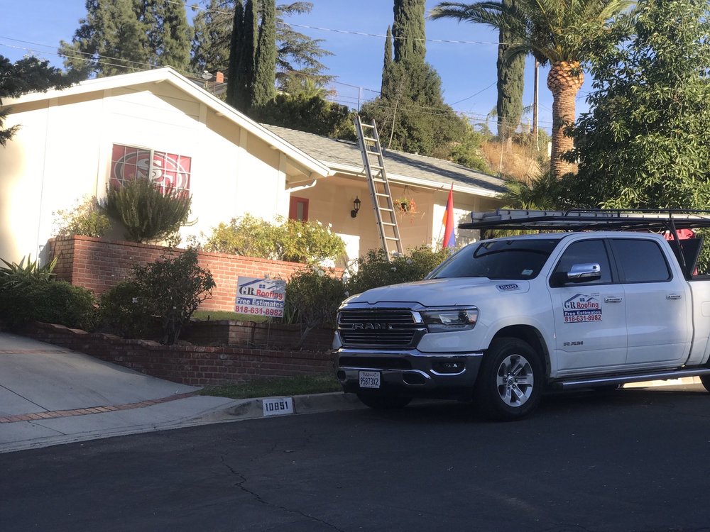 Slide of G R Roofing