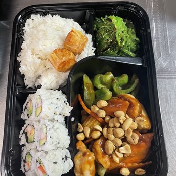 Ming Hing - a tray of food with rice and vegetables - Chinese Near Me - Florida, New York