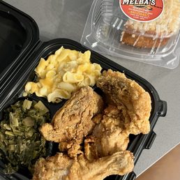 Fried chicken, greens, mac & cheese, and a slice of caramel crunch cake. Fried chicken, greens, mac & cheese, and a slice of caramel crunch cake.
