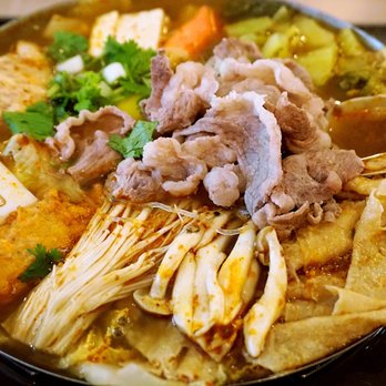 Boiling Point - Lamb Hot Pot: napa, vermicelli, enoki, lamb, clam, tofu, egg, taro, mustard greens, fish cake, tempura, crab stick, tofu skin ($14.65). - Taiwanese Near Me - Redmond, Washington Boiling Point - Lamb Hot Pot: napa, vermicelli, enoki, lamb, clam, tofu, egg, taro, mustard greens, fish cake, tempura, crab stick, tofu skin ($14.65). - Taiwanese Near Me - Redmond, Washington