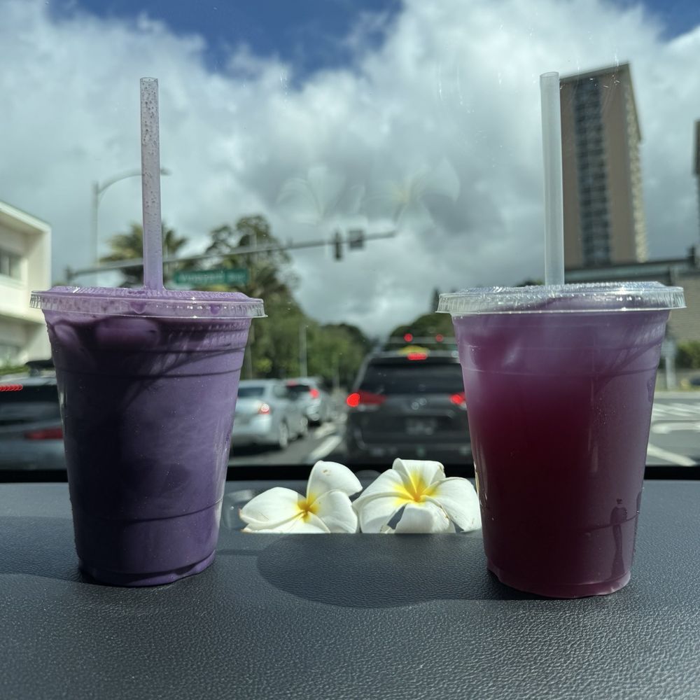 Ali’i Coffee - Iced Ube Latte (left) and Purple Haze (right) ft plumerias! - Coffee & Tea Near Me - Honolulu, Hawaii