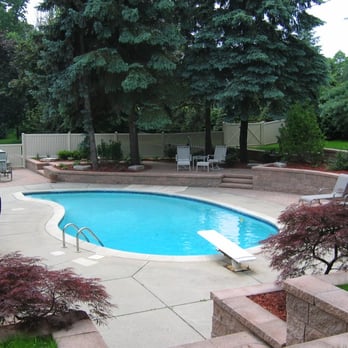 Soulliere Companies - a pool in a backyard - Landscaping Near Me - Romeo, Michigan Soulliere Companies - a pool in a backyard - Landscaping Near Me - Romeo, Michigan