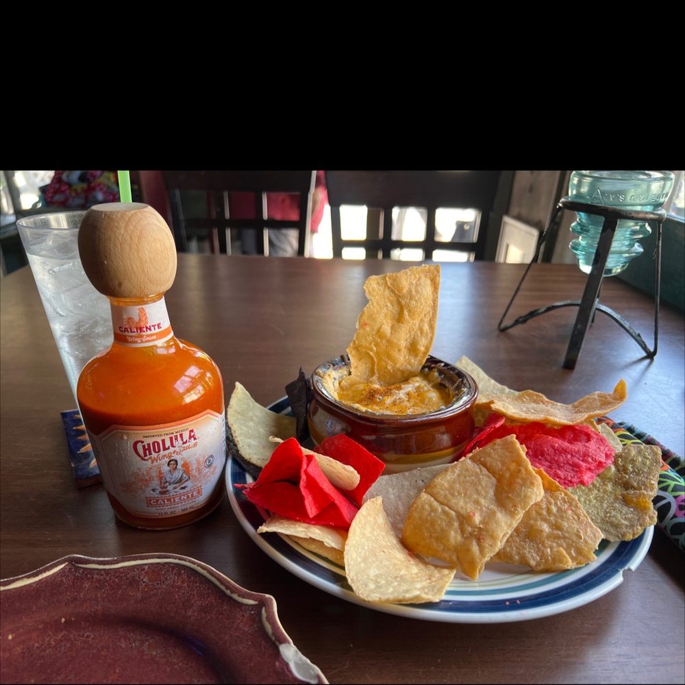 Gina's Cafe - Spicy Crab dip w/Cholula hot sauce on the side. This is delicious!!!!! The hot sauce on the side is everything for this dish. - Beer, Wine & Spirits Near Me - Saint Michaels, Maryland