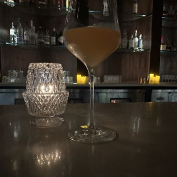 Kira - Midas's Touch, was a great spin on a French 75 but made with Brandy & Sparkling Sake - Mediterranean Near Me - New Orleans, Louisiana