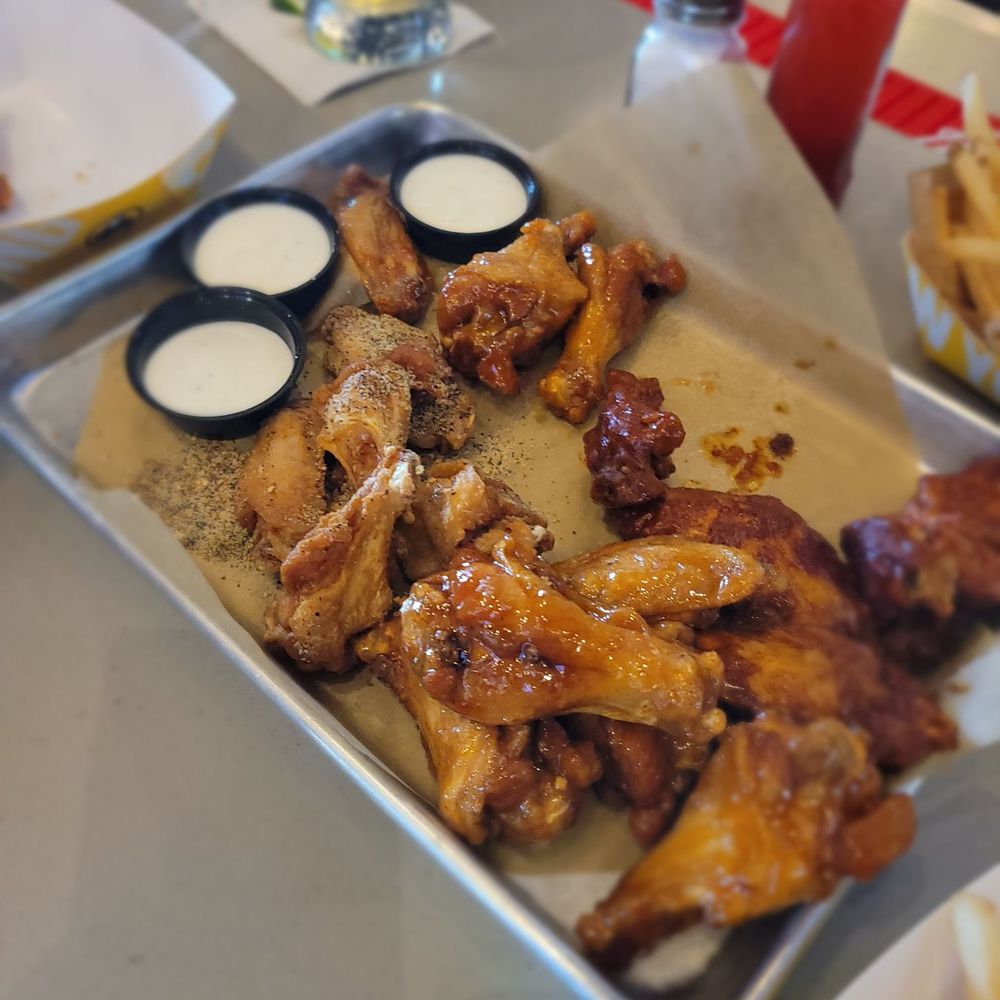 Buffalo Wild Wings - Dry wings with no flavor, look at all the seasoning on the lemon pepper. - Chicken Wings Near Me - Carson, California Buffalo Wild Wings - Dry wings with no flavor, look at all the seasoning on the lemon pepper. - Chicken Wings Near Me - Carson, California