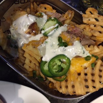 Topgolf - Pulled pork waffle fries - New American Near Me - Orlando, Florida Topgolf - Pulled pork waffle fries - New American Near Me - Orlando, Florida