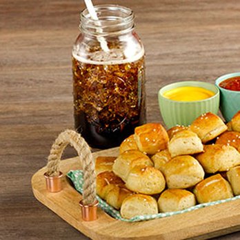 Ben's Soft Pretzels - a tray of pretzels with dipping sauce - Pretzels Near Me - Rossford, Ohio Ben's Soft Pretzels - a tray of pretzels with dipping sauce - Pretzels Near Me - Rossford, Ohio