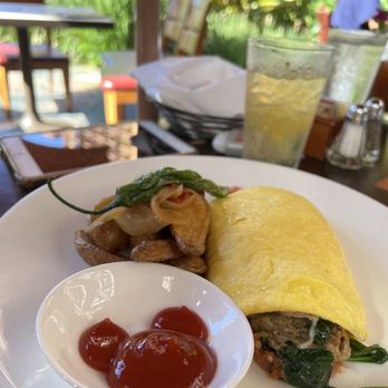 Makahiki - KĀLUA PIG OMELET -three cage-free eggs, kãlua pig, baby spinach, local tomatoes gruyere cheese, herb-roasted potatoes - Bars Near Me - Kapolei, Hawaii Makahiki - KĀLUA PIG OMELET -three cage-free eggs, kãlua pig, baby spinach, local tomatoes gruyere cheese, herb-roasted potatoes - Bars Near Me - Kapolei, Hawaii