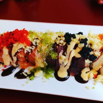 Tachikawa - Tiffany roll $14.95 / spicy tuna & crab inside / topped with sauce, macadamia nuts and tobiko - Japanese Near Me - Pinole, California Tachikawa - Tiffany roll $14.95 / spicy tuna & crab inside / topped with sauce, macadamia nuts and tobiko - Japanese Near Me - Pinole, California