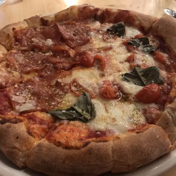 M'tucci's Moderno - Half and half - half pepperoni and half margarita - perfection.  Seriously delicious and a great chew to the crust. - Italian Near Me - Rio Rancho, New Mexico