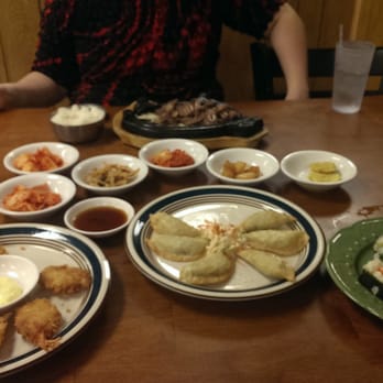 Seoul Bistro - Banchan (the small bowls of sides), fried shrimp, dumplings, kimbap, and galbi with a side of rice. Delicious! - Korean Near Me - Tulsa, Oklahoma